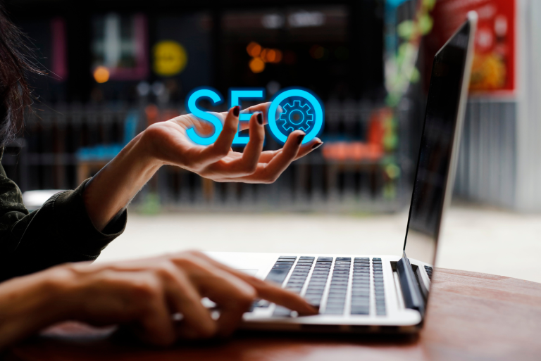 A woman holding SEO in her hands to understand how long it may take to work